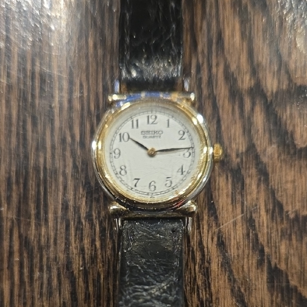 Seiko Gold Case with Black Strap Watch